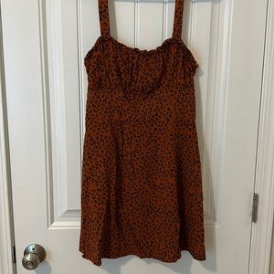 Burnt orange leopard print mini flowy dress